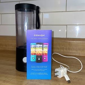 BlendJet Blender with charger and info pamphlet.